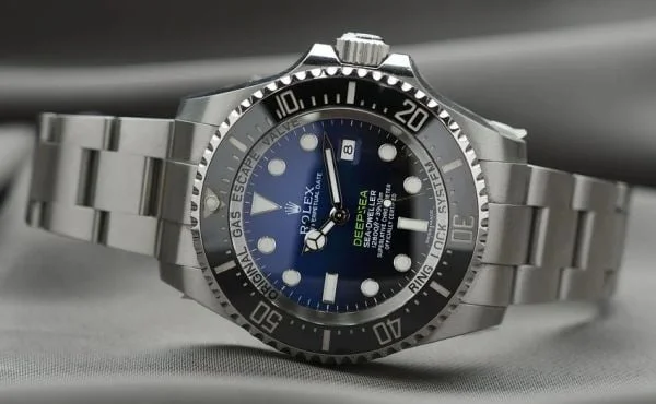 A Rolex brand, fishing watch in silver wristband.
